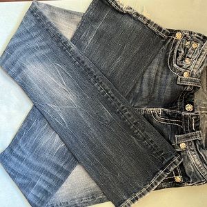 Woman’s bejeweled jeans.